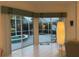 Spacious living room with decorative lighting and access to the enclosed patio featuring a tiled hot tub spa at 8616 15Th Nw Ave, Bradenton, FL 34209