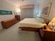 Comfortable main bedroom featuring neutral walls, carpet, and bright lighting for a warm atmosphere at 8616 15Th Nw Ave, Bradenton, FL 34209