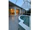 Enclosed patio shows tiled hot tub spa, with ample space for relaxation, and outdoor access at 8616 15Th Nw Ave, Bradenton, FL 34209