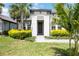 Close-up of the home's entrance, highlighting the door and manicured landscaping at 918 Fernleaf Run, Bradenton, FL 34212