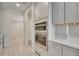 Kitchen features double oven, ample counter space and views of the dining area at 918 Fernleaf Run, Bradenton, FL 34212