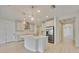 Bright and airy kitchen featuring an island, stainless steel appliances, and pendant lighting at 918 Fernleaf Run, Bradenton, FL 34212