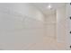 Walk-in closet with ample shelving and storage at 918 Fernleaf Run, Bradenton, FL 34212