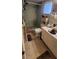 Cozy bathroom featuring a shower, toilet, vanity and neutral-toned finishes at 120 Sw Monroe N Cir, St Petersburg, FL 33703