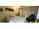 This bedroom features a bed and ceiling fan at 120 Sw Monroe N Cir, St Petersburg, FL 33703