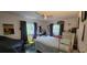Bedroom featuring ample natural light, ceiling fan and neutral-toned finishes at 120 Sw Monroe N Cir, St Petersburg, FL 33703
