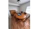 Charming dining area with an oval wood table and traditional chairs, perfect for gatherings at 1224 38Th W St, Bradenton, FL 34205