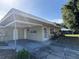 Welcoming home with an attached carport offering ample parking and curb appeal at 1224 38Th W St, Bradenton, FL 34205