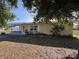 Well-maintained home featuring a covered carport, offering a blend of comfort and convenience at 1224 38Th W St, Bradenton, FL 34205