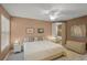 Bedroom offering a king bed and a side table on wheels at 13391 Dimarco St, Venice, FL 34293