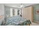 Cozy bedroom with bright light from windows, and a large closet at 13391 Dimarco St, Venice, FL 34293