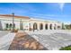 The Venice Public Library features arched entryways, red-tiled roofing, and a manicured landscape at 13391 Dimarco St, Venice, FL 34293