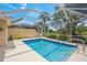 Refreshing screened pool under sunny skies at 13391 Dimarco St, Venice, FL 34293