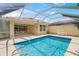 Enjoy swimming in the screened pool under the Florida sunshine at 13391 Dimarco St, Venice, FL 34293