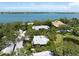 A stunning aerial view of the property, nestled among lush greenery and featuring a picturesque waterfront setting at 1347 Landings Dr # 6, Sarasota, FL 34231