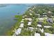 Waterfront community homes feature lush greenery, serene setting and water access, perfect for a tranquil and picturesque lifestyle at 1347 Landings Dr # 6, Sarasota, FL 34231