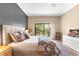 Bedroom with view to balcony and nice decorative rug at 1347 Landings Dr # 6, Sarasota, FL 34231