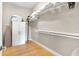 Walk-in closet includes shelving, storage, and space for organization at 1347 Landings Dr # 6, Sarasota, FL 34231