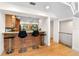 Kitchen area featuring bar seating and hardwood floors at 1347 Landings Dr # 6, Sarasota, FL 34231
