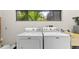 Convenient laundry area with a side-by-side washer and dryer at 1347 Landings Dr # 6, Sarasota, FL 34231