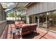 A spacious outdoor lanai with comfortable seating and a grill, great for relaxing and entertaining guests at 1347 Landings Dr # 6, Sarasota, FL 34231