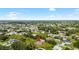 Aerial view of a home with lush green surroundings in a well-established neighborhood at 1532 Maricopa Rd, North Port, FL 34287