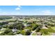 An aerial view of a community with verdant landscaping and mature trees at 1532 Maricopa Rd, North Port, FL 34287