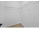 Empty walk-in closet featuring wire shelving at 1532 Maricopa Rd, North Port, FL 34287