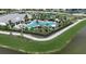 Aerial view of the community pool and recreation area, perfect for relaxation and entertainment at 16048 Ivy Ridge Ct, Port Charlotte, FL 33953