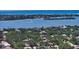 Expansive aerial view showcasing the stunning community and its proximity to the beautiful bay waters at 1627 Peregrine Point Ct, Sarasota, FL 34231