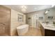 Bright modern bathroom with dual sinks, a soaking tub, and a separate shower at 1627 Peregrine Point Ct, Sarasota, FL 34231