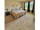 Serene bedroom with neutral tones, a large window, and a comfortable queen-sized bed at 1646 Pierpoint St, North Port, FL 34288
