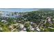Gorgeous aerial view of a beautiful home, lush surroundings, and waterfront access at 1658 Bonita Ln, Sarasota, FL 34239