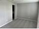 A room with neutral walls and carpet perfect for furnishing to your liking at 17637 Cantarina Cv, Bradenton, FL 34211