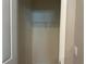 Walk-in closet features built-in shelving for optimal storage and organization, ready for your personal touch at 17637 Cantarina Cv, Bradenton, FL 34211