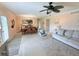 Open floor plan featuring a cozy living area and dining space with kitchen view at 1959 Toucan Way # 206, Sarasota, FL 34232