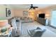 Inviting living room featuring a large sectional sofa and contemporary decor at 1959 Toucan Way # 206, Sarasota, FL 34232