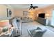Bright and spacious living room with comfortable seating and natural light at 1959 Toucan Way # 206, Sarasota, FL 34232