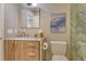Updated bathroom with wood-grain vanity, marble countertop, gold hardware, and decorative tile shower at 2103 Harbourside Dr # 1102, Longboat Key, FL 34228