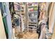 Organized walk-in closet with ample shelving, drawers and storage for clothing at 2103 Harbourside Dr # 1102, Longboat Key, FL 34228