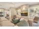Living room showcasing a contemporary design with custom built ins and lots of natural light at 2103 Harbourside Dr # 1102, Longboat Key, FL 34228