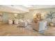 Elegant living room showcasing stylish decor and comfortable seating around a glass coffee table at 2103 Harbourside Dr # 1102, Longboat Key, FL 34228