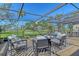 The covered patio has comfortable seating with excellent views of the golf course at 2103 Harbourside Dr # 1102, Longboat Key, FL 34228