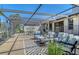 Enjoy outdoor living on this covered patio with a golf course view at 2103 Harbourside Dr # 1102, Longboat Key, FL 34228