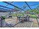 Outdoor patio offers a serene space for dining with golf course views and comfortable seating at 2103 Harbourside Dr # 1102, Longboat Key, FL 34228