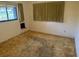 Bedroom featuring neutral walls and window for natural light at 211 55Th Nw St, Bradenton, FL 34209
