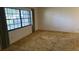 Bedroom with a large window that provides plenty of natural light at 211 55Th Nw St, Bradenton, FL 34209
