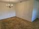 Traditional dining room with a chandelier and ample space for entertaining at 211 55Th Nw St, Bradenton, FL 34209