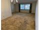 Bright dining room with a large window offering plenty of natural light at 211 55Th Nw St, Bradenton, FL 34209