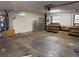 Spacious garage with a workbench and windows at 211 55Th Nw St, Bradenton, FL 34209